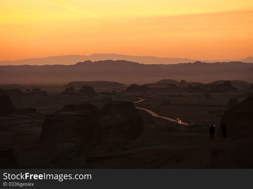 Two photographer were waiting for sunset.Xinjiang province,China.