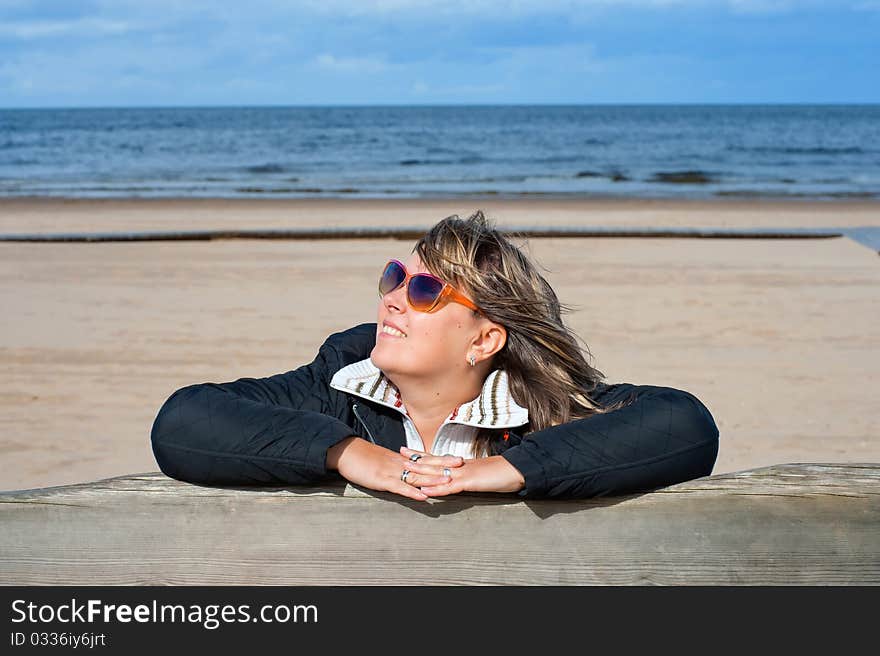 Woman relaxing at the sea.