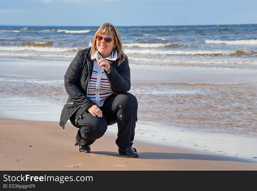 Woman Relaxing At The Sea.