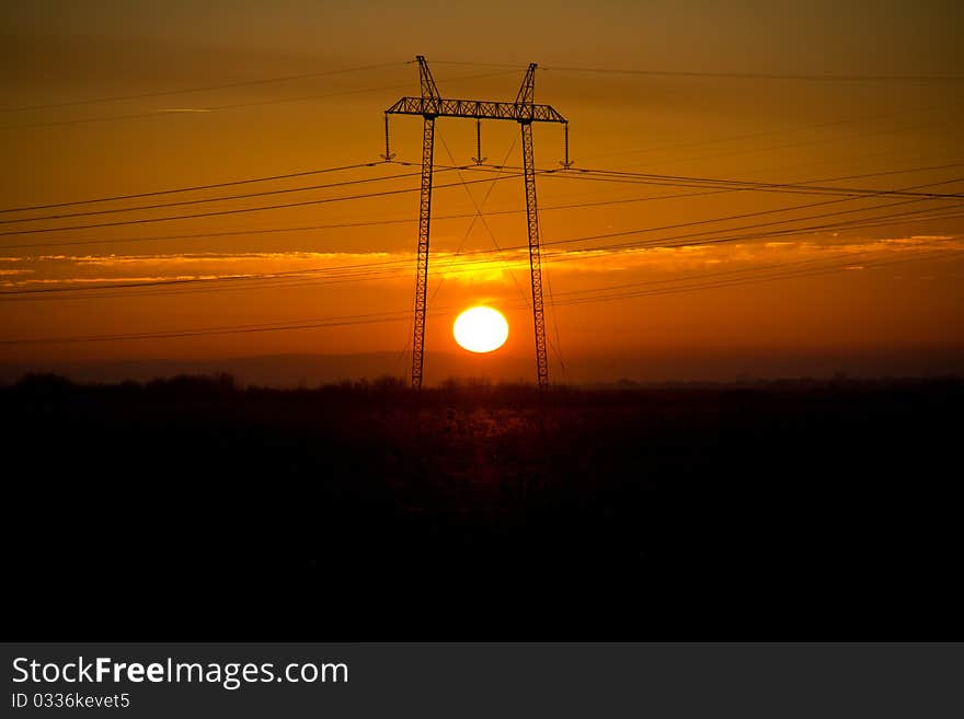 Beautifull sunset behind power line. Beautifull sunset behind power line