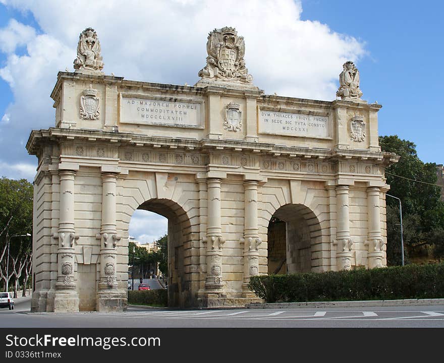 Porte des Bombes arch - ancient ornamental gate, which formed the outer defensive walls of Valletta, Malt