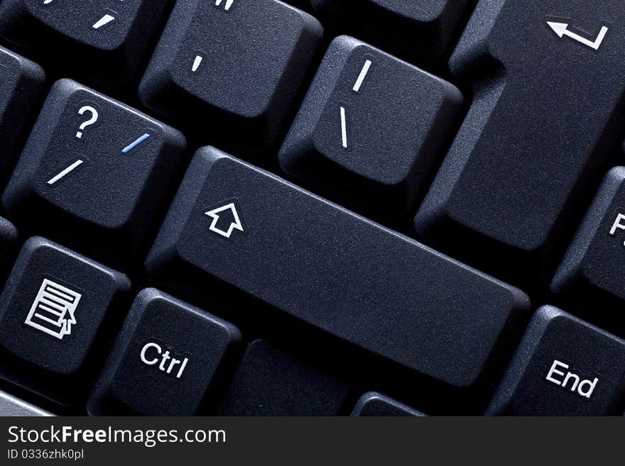 Keyboard of a notebook computer. White and black.