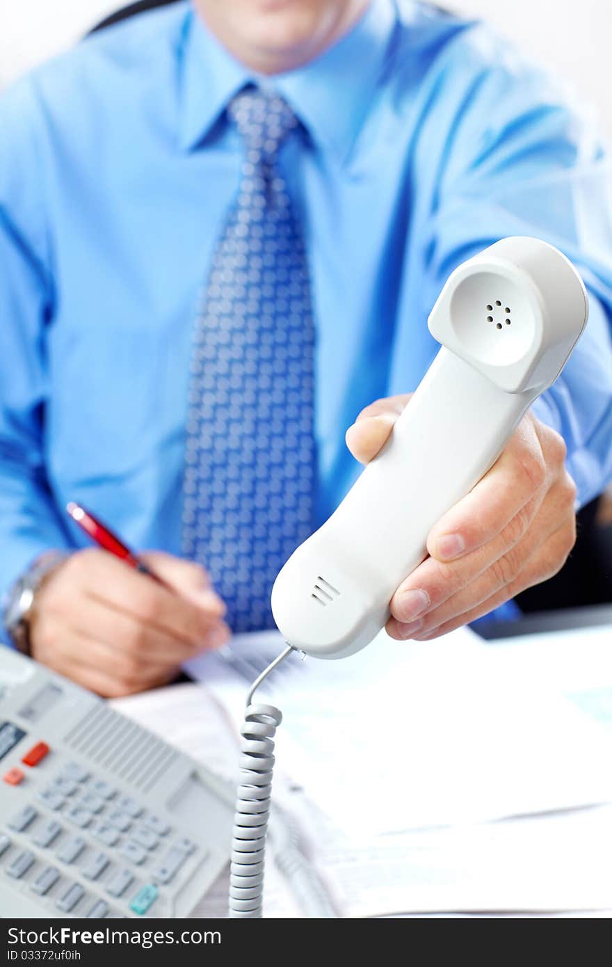 Businessman with telephone in the office