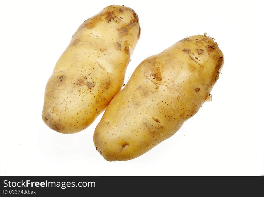 Two potatoes islated on white.