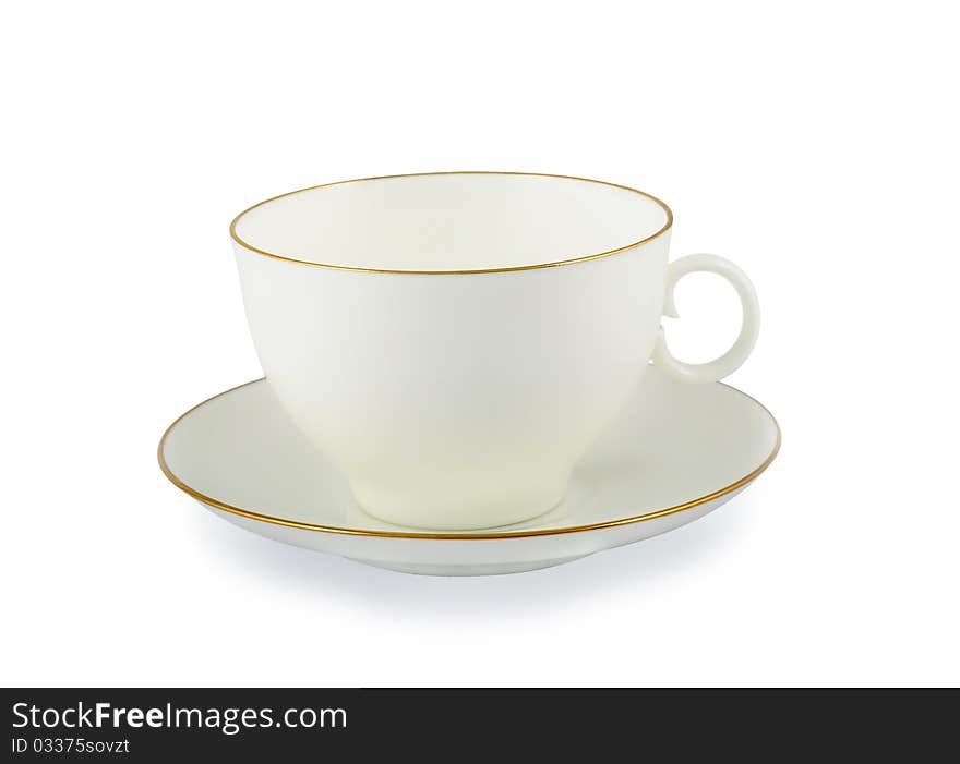 Empty white tea cup and saucer isolated on white with  light shadow