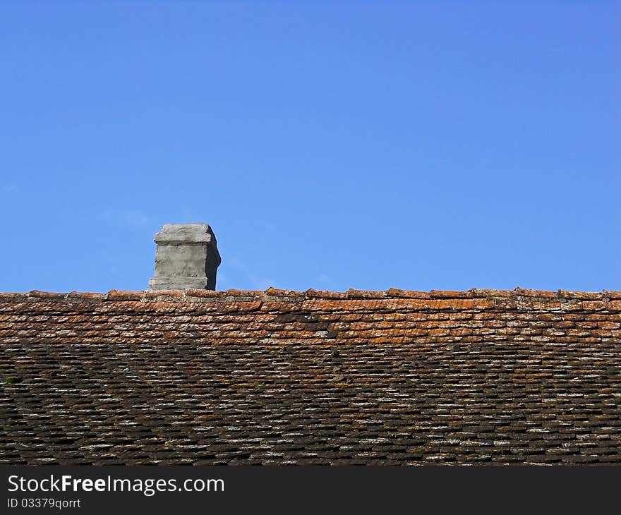 Image of a roof and chimney, countryside house