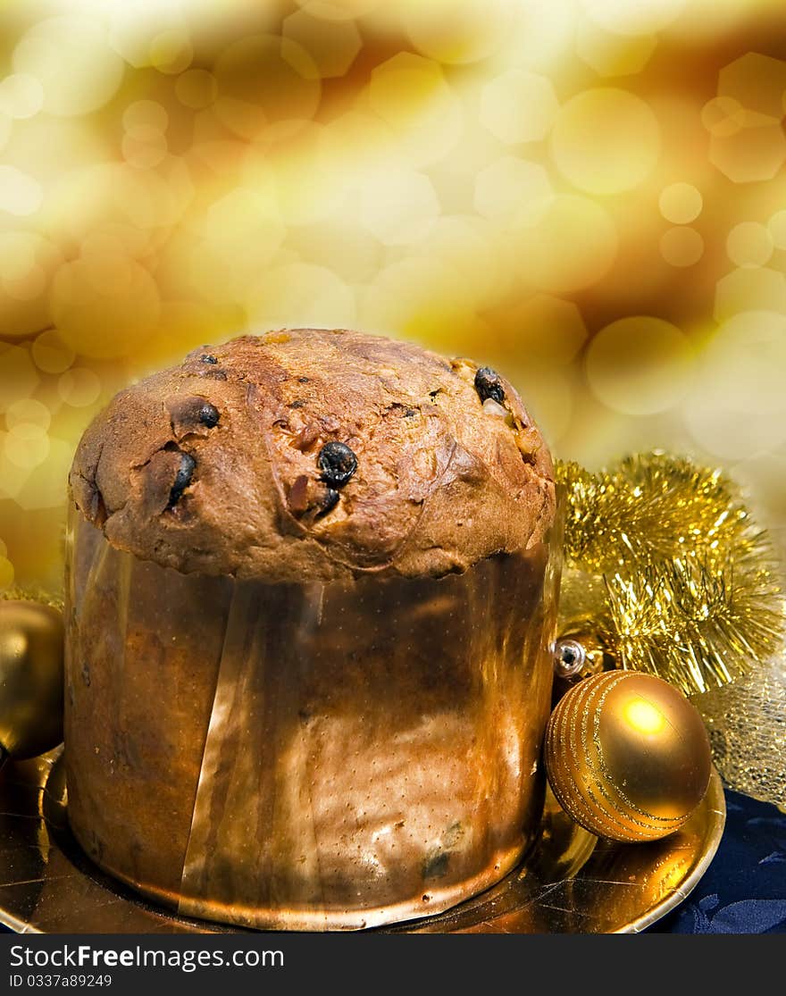 Cake on and bokeh background and Christmas decorations. Cake on and bokeh background and Christmas decorations