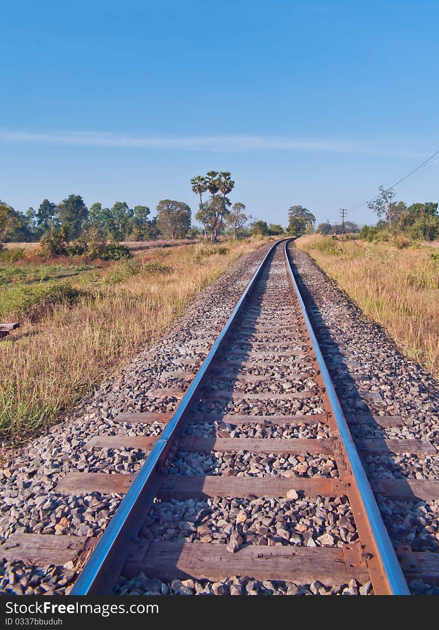 The 1 metre width Thai railway passed through agriculture field. The 1 metre width Thai railway passed through agriculture field.