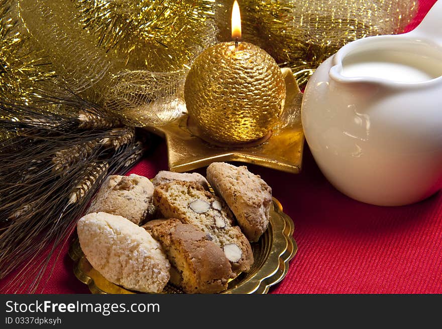 Cookies and milk and golden candle