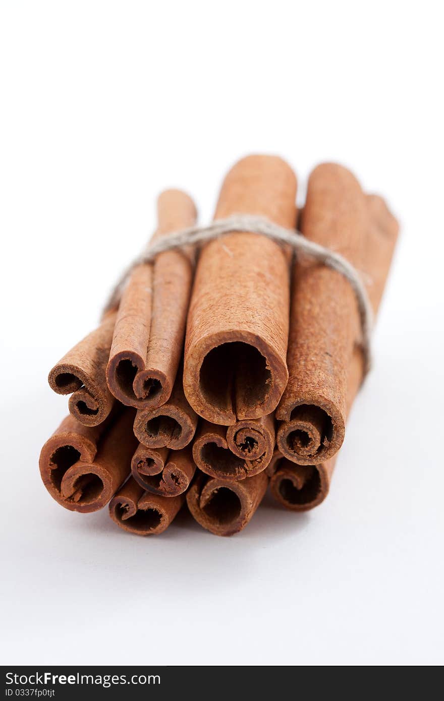 Group Of Cinnamon Sticks On White Background