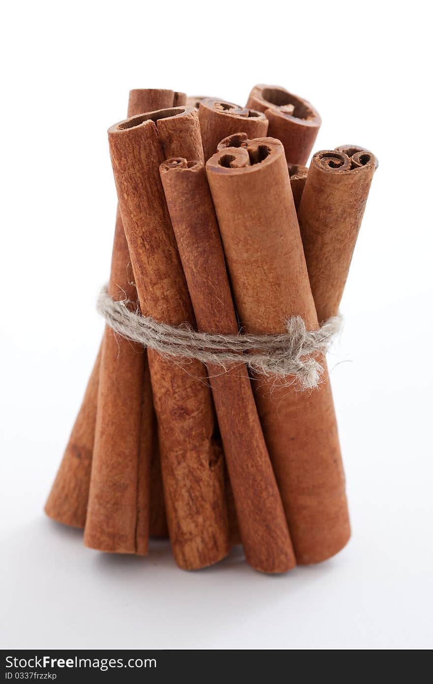 Group Of Cinnamon Sticks On White Background