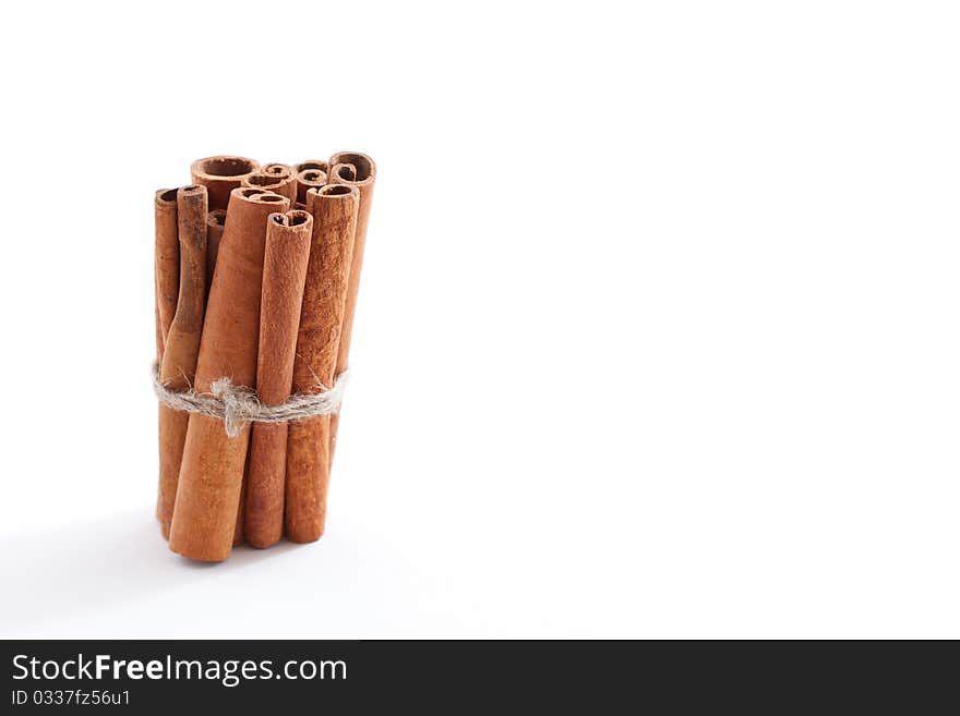 Group of cinnamon sticks on white background