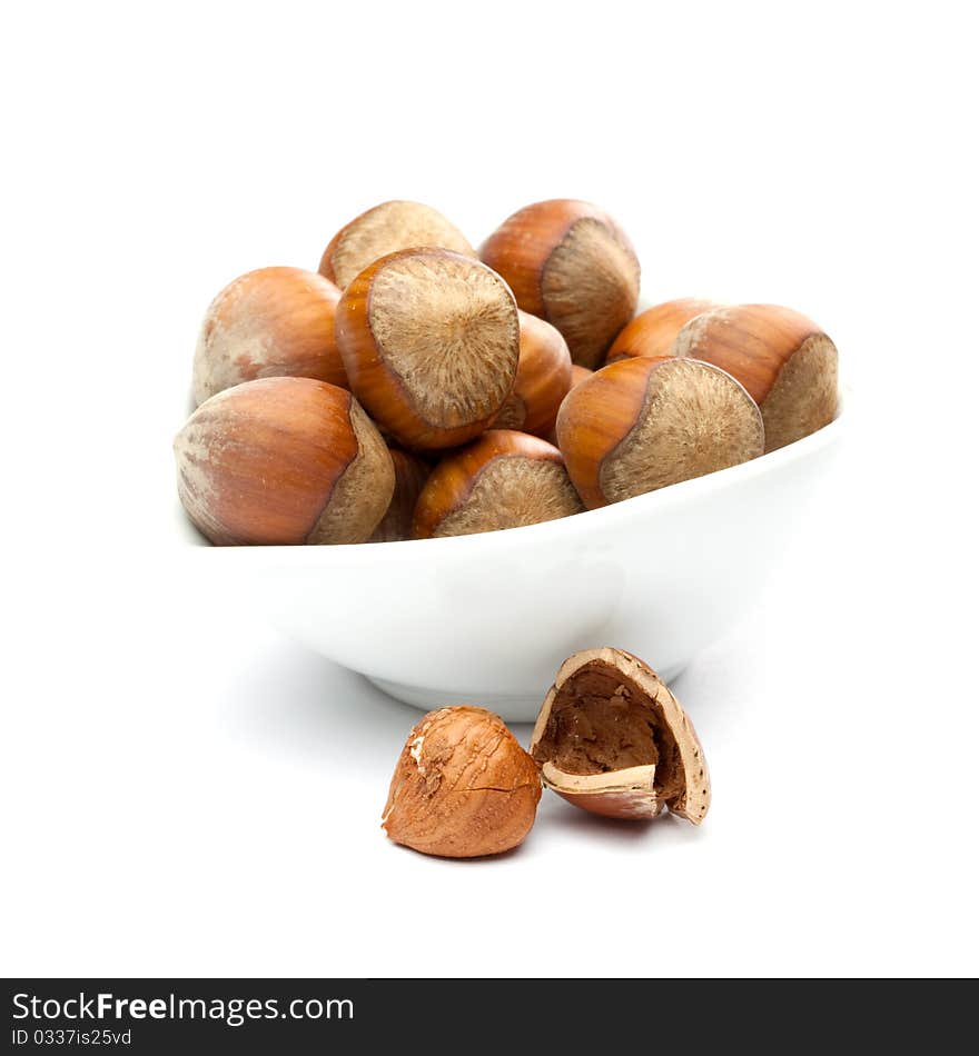 Hazelnuts isolated on white background