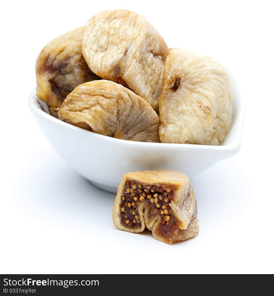 Fresh dried figs isolated on white background in a bowl