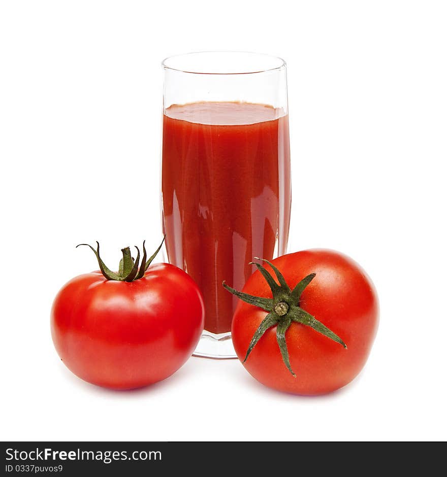 Fresh Tomatoes And A Glass Full Of Tomato Juice