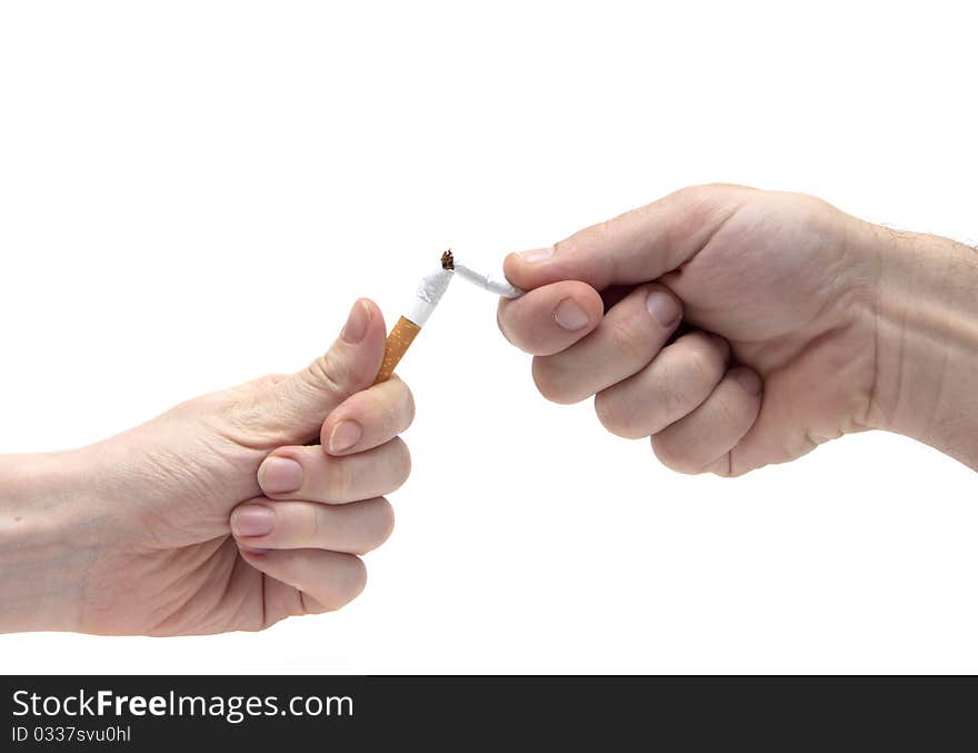 Broken cigarette in hands