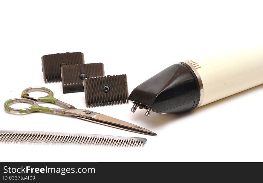 Vintage set of tools for cutting hair on white