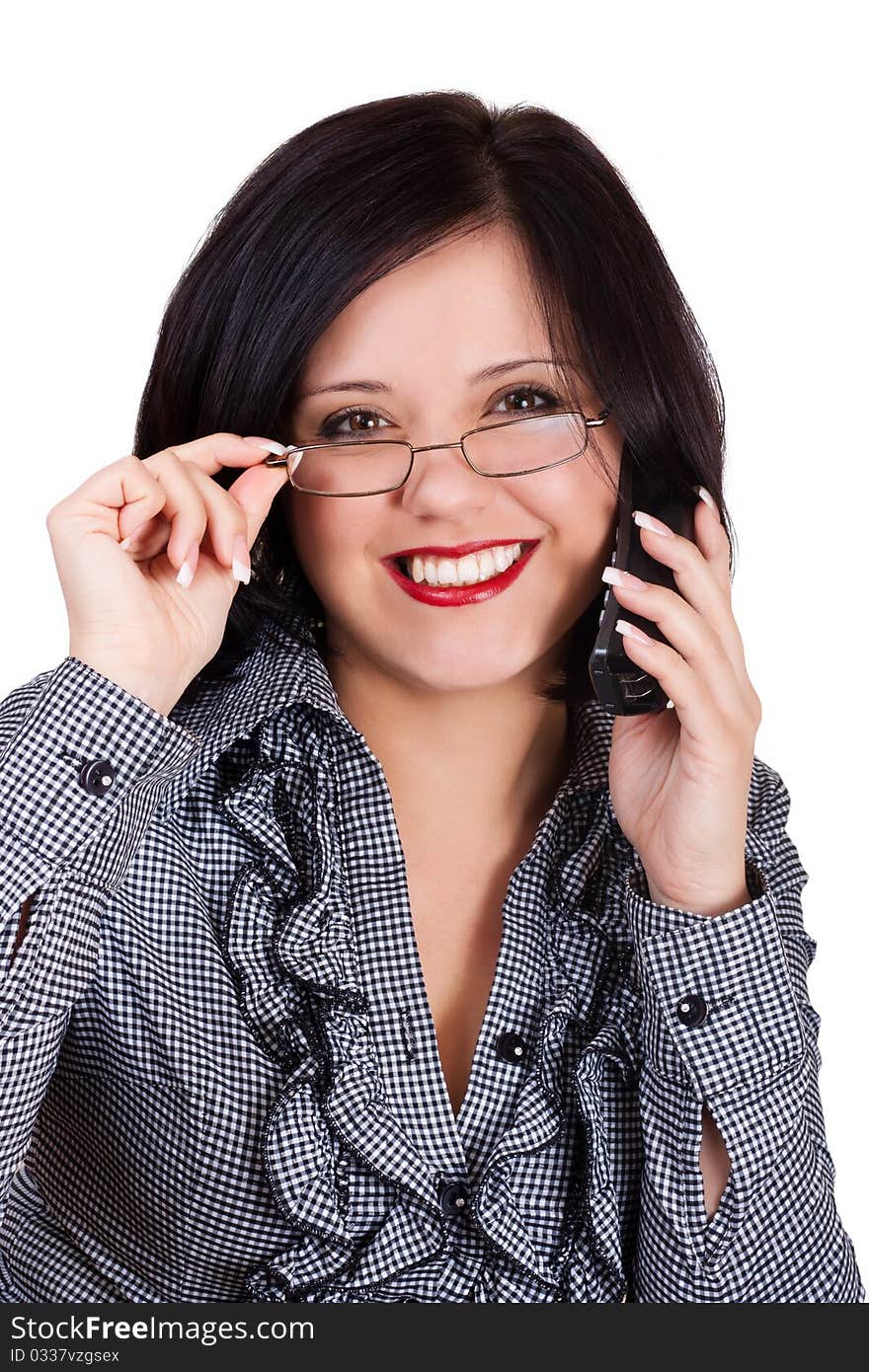 Smiling business woman talking on the phone on a white background. Smiling business woman talking on the phone on a white background