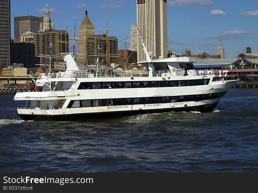 Boat cruising with Manhattan at the background