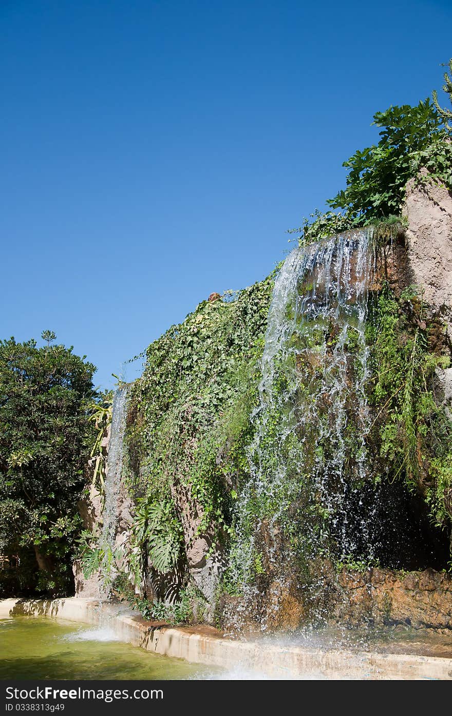 Waterfall and grotto in the Genoves park, Cadiz