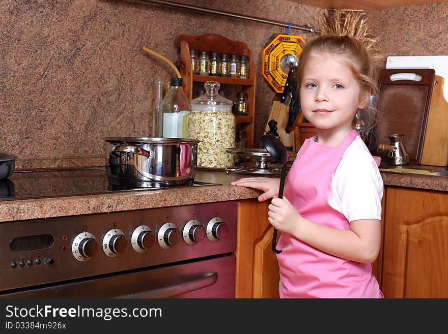 Girl cooking in the kitchen