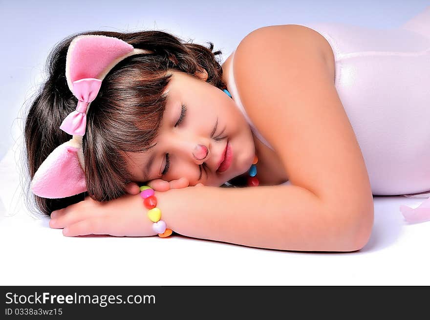 Girl with pink tutu on a white background