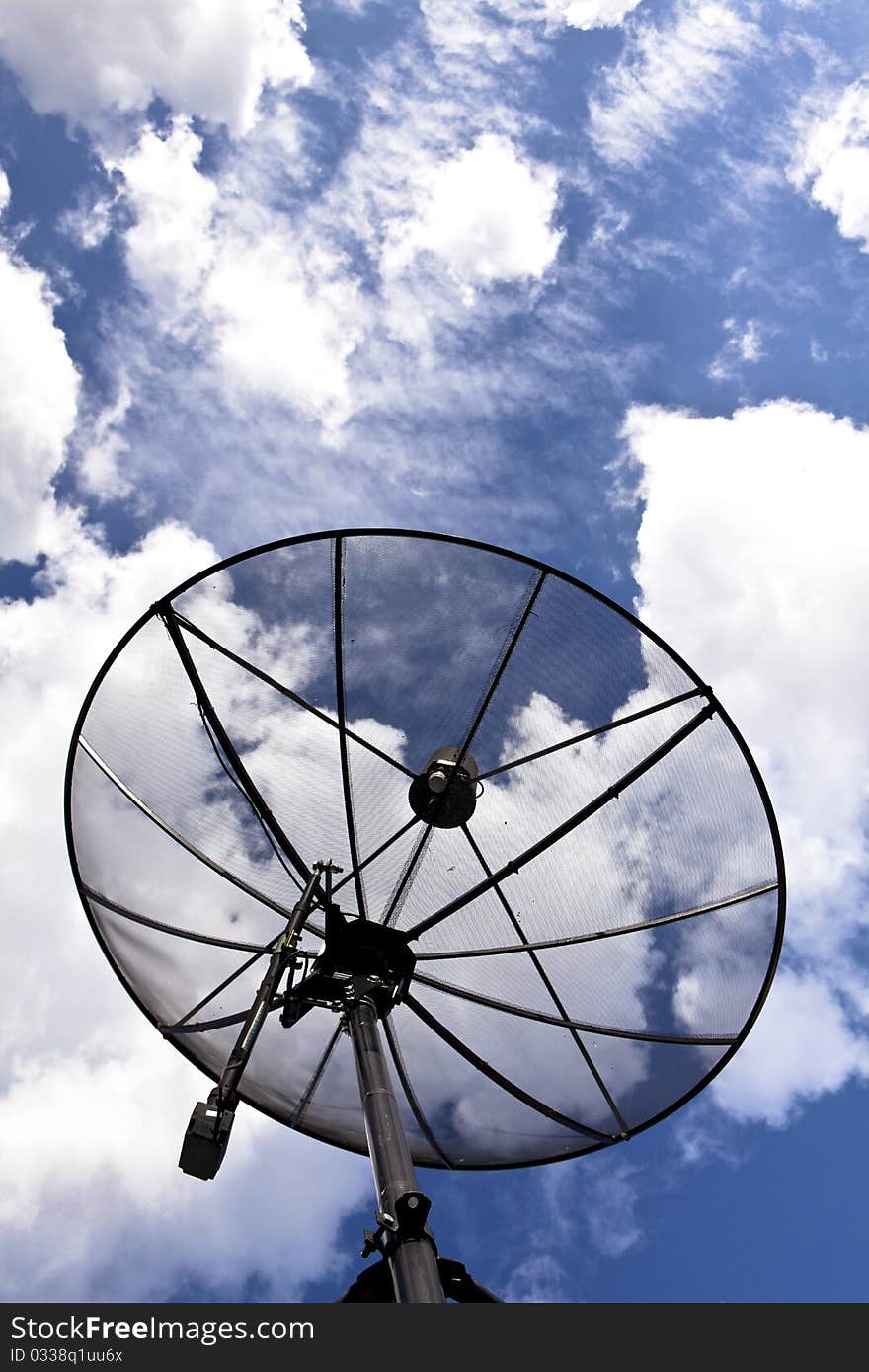 Satellite dish with sky background