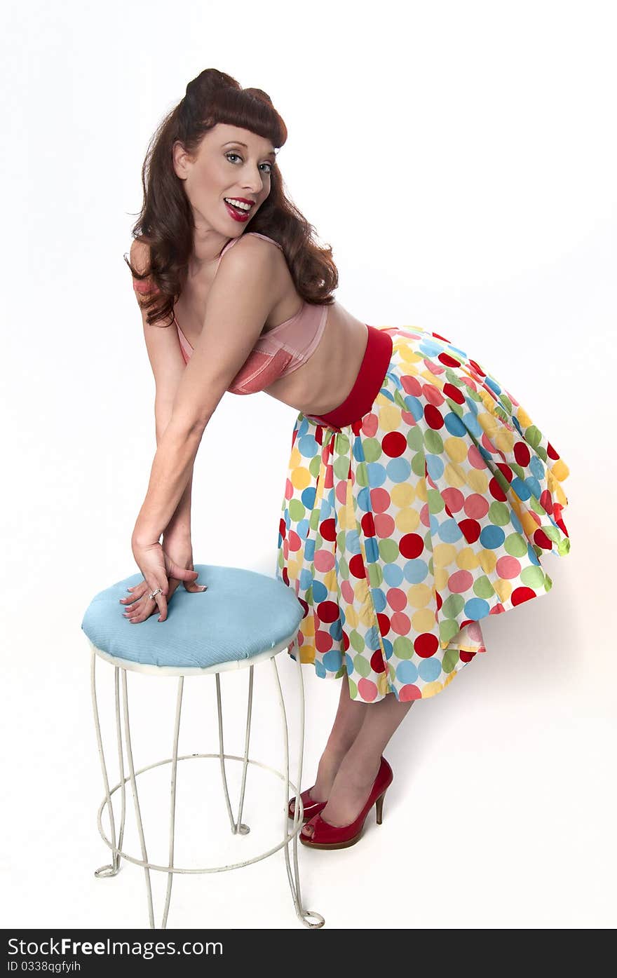 pinup girl wearing bra and polka dot skirt. pinup girl wearing bra and polka dot skirt