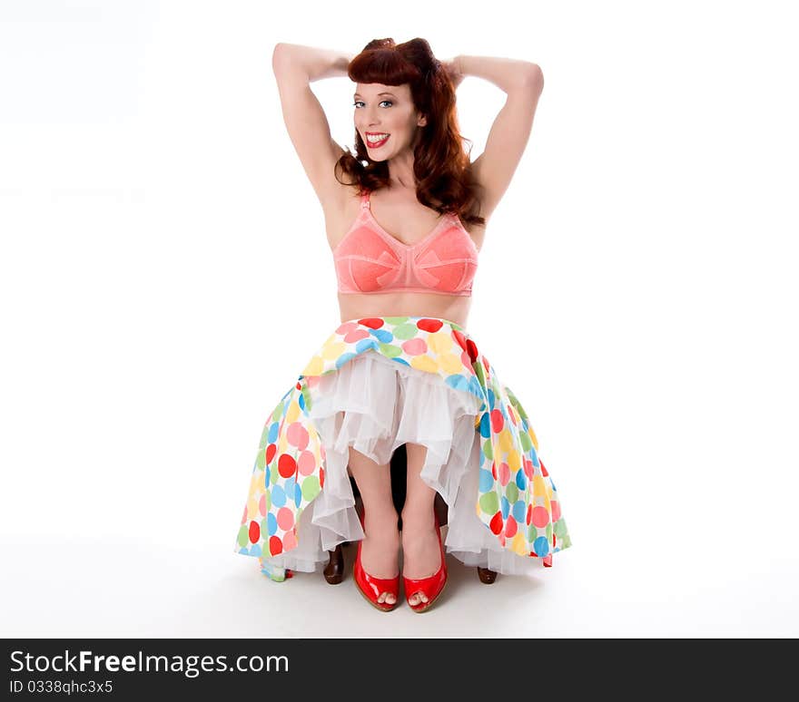 pinup girl wearing bra and polka dot skirt. pinup girl wearing bra and polka dot skirt