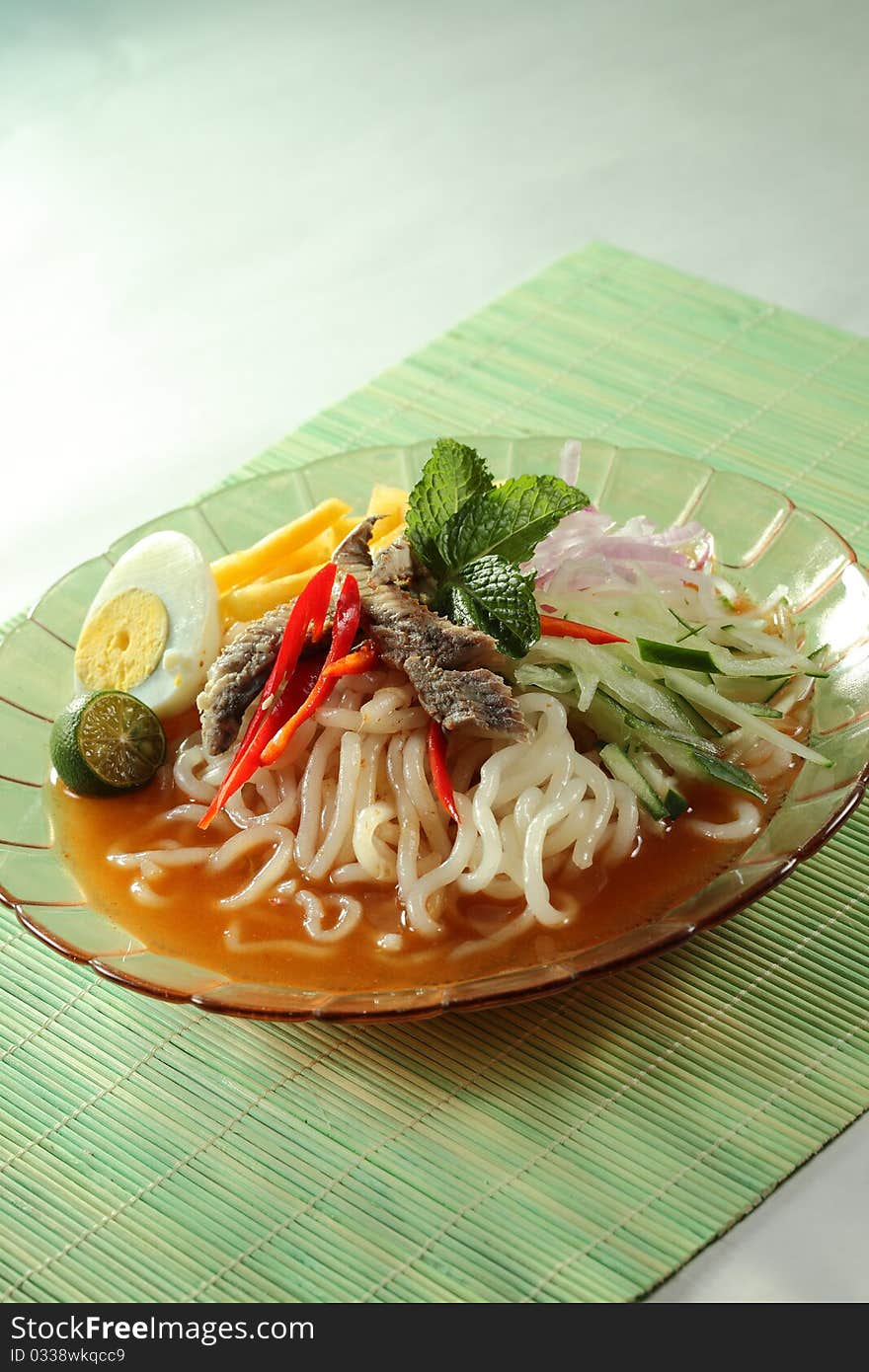 Malaysian Malay traditional spicy gravy noodle. Malaysian Malay traditional spicy gravy noodle