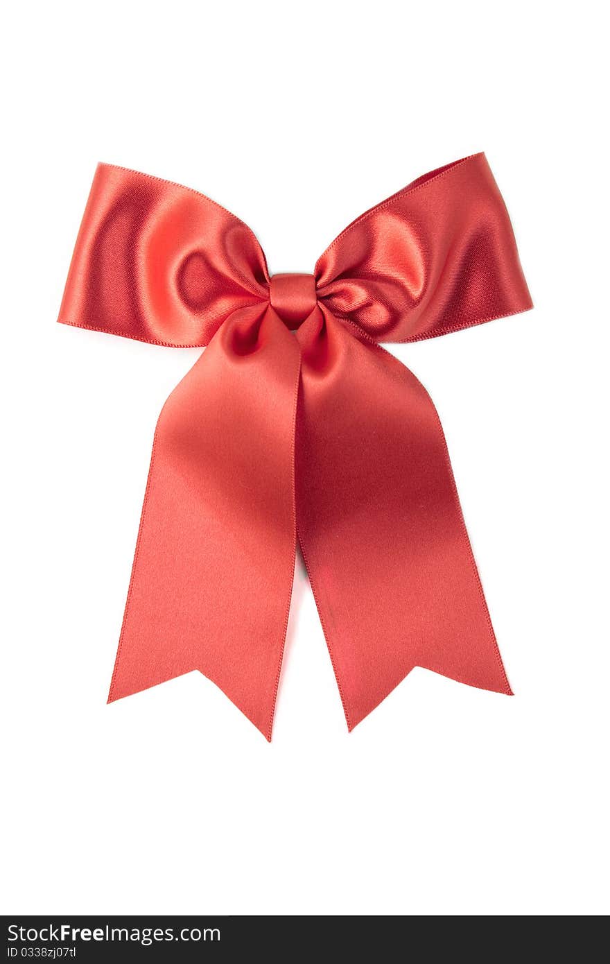 Red satin gift bow. Ribbon. Isolated on white