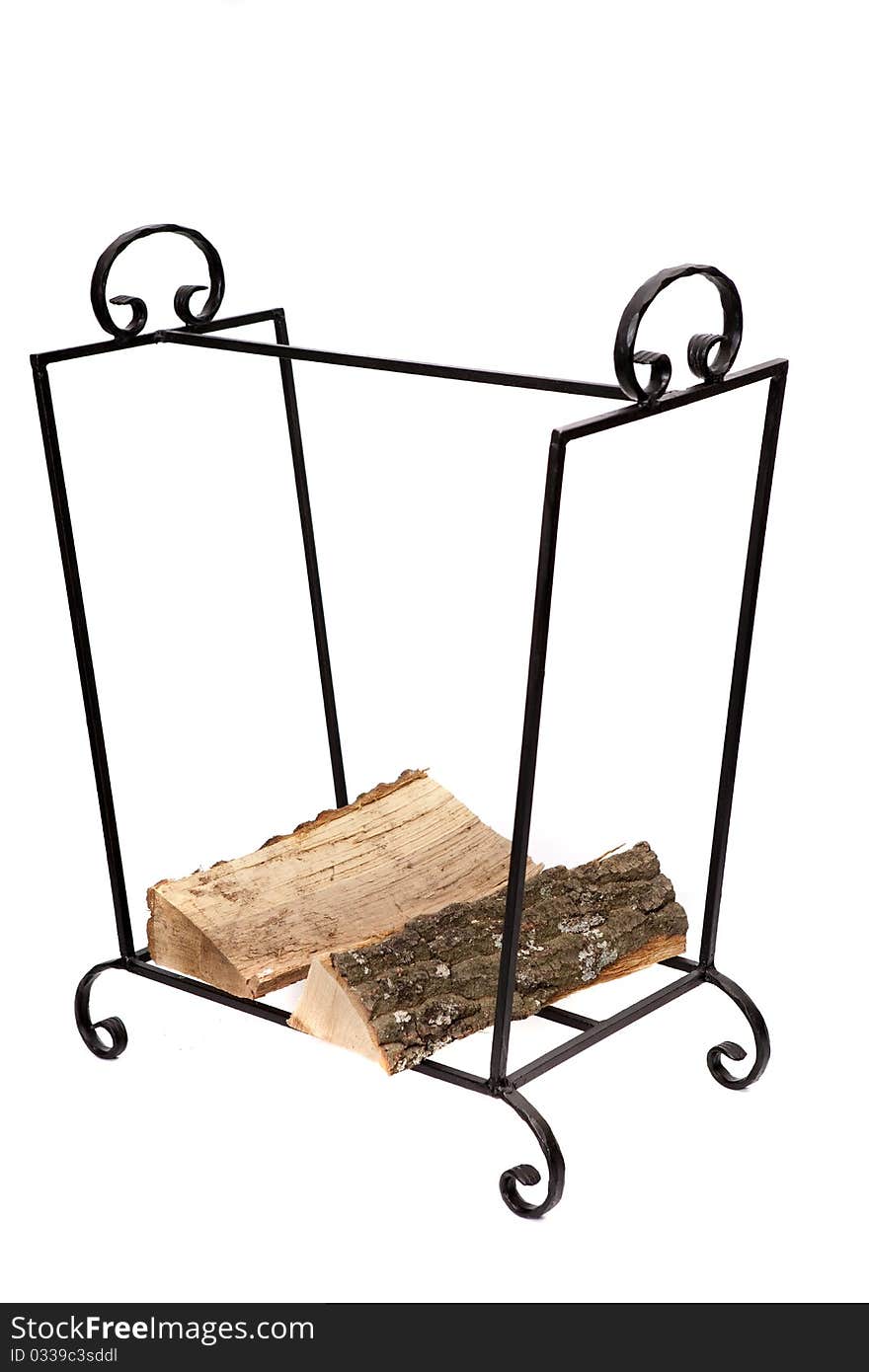 Fireplace wrought iron wood holder on white background. Fireplace wrought iron wood holder on white background