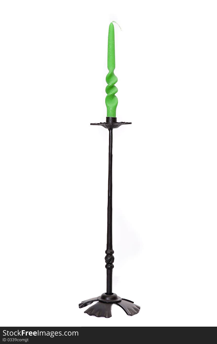 Metal candelholder with green candle