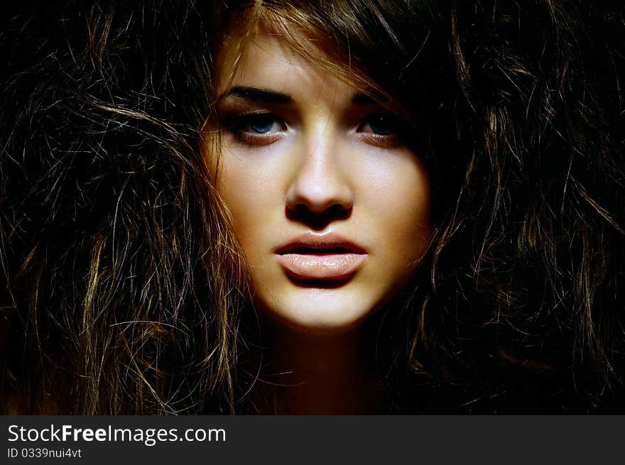 Portrait of the girl with a mad hairdress. Portrait of the girl with a mad hairdress