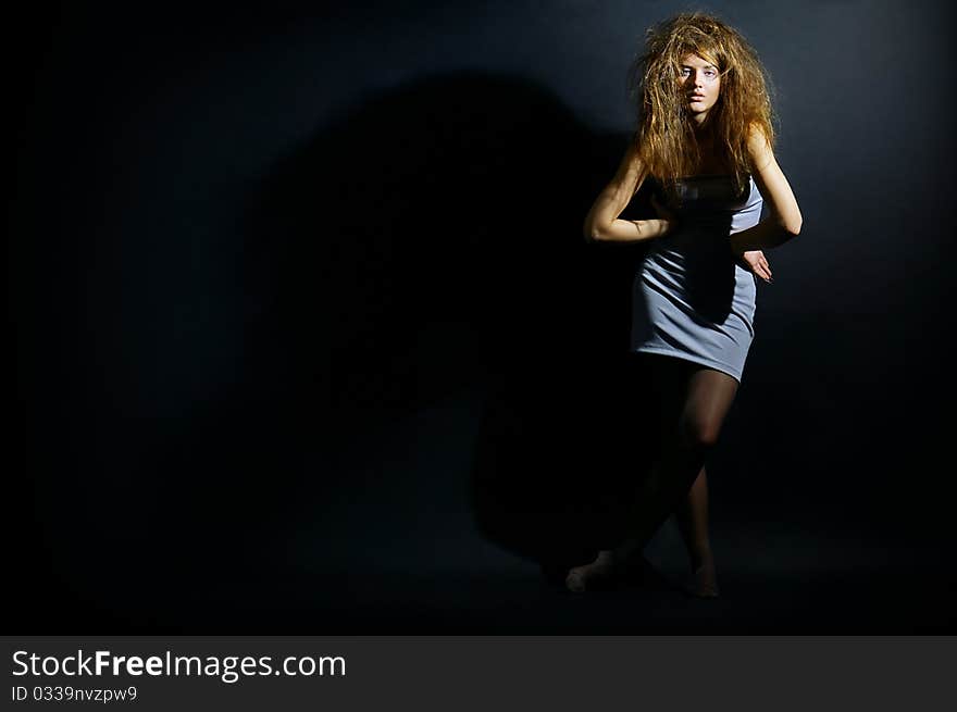 Portrait of the girl with a mad hairdress. Portrait of the girl with a mad hairdress