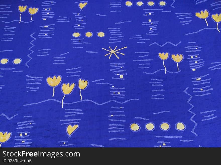 Blanket of yellow flowers and blue background