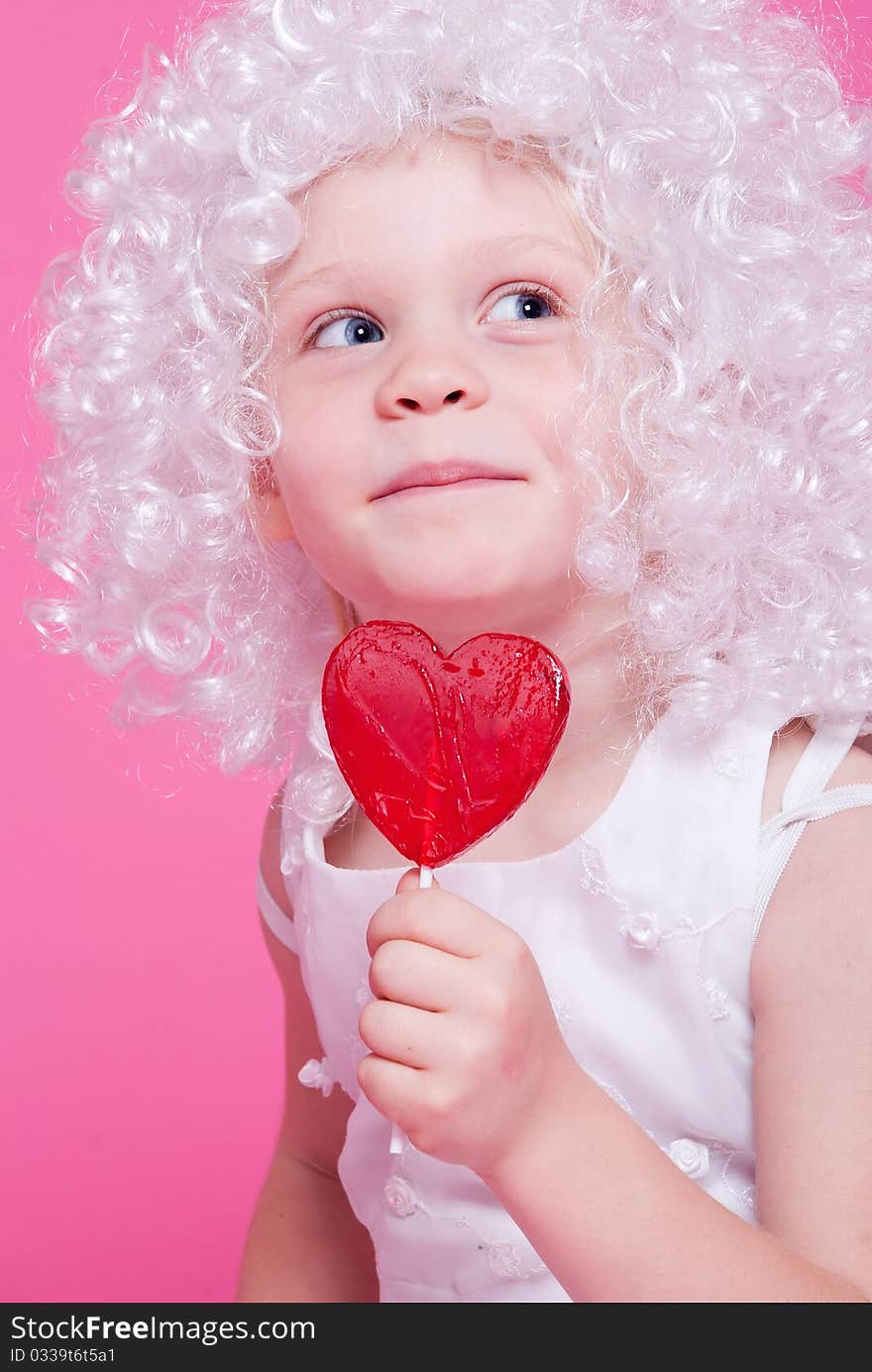 Little angel on pink background