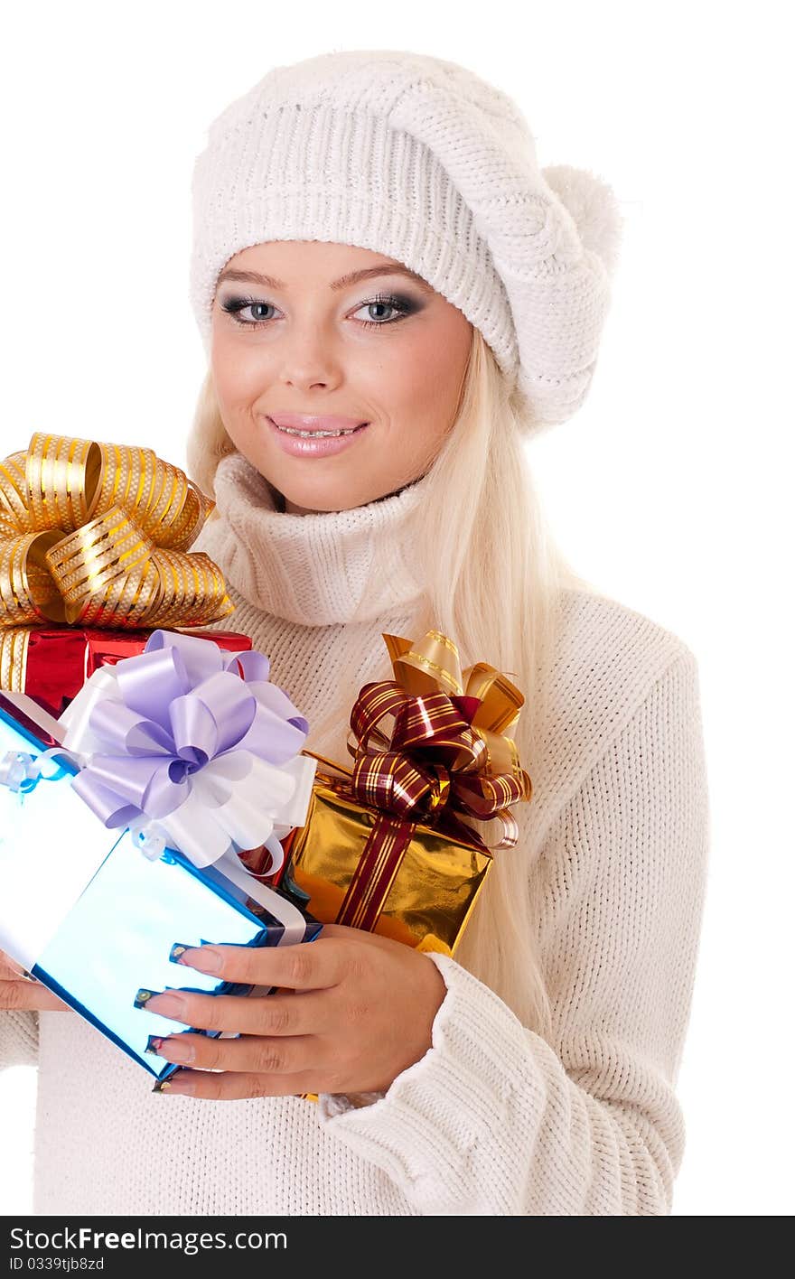 Girl holding a presents on white background. Girl holding a presents on white background