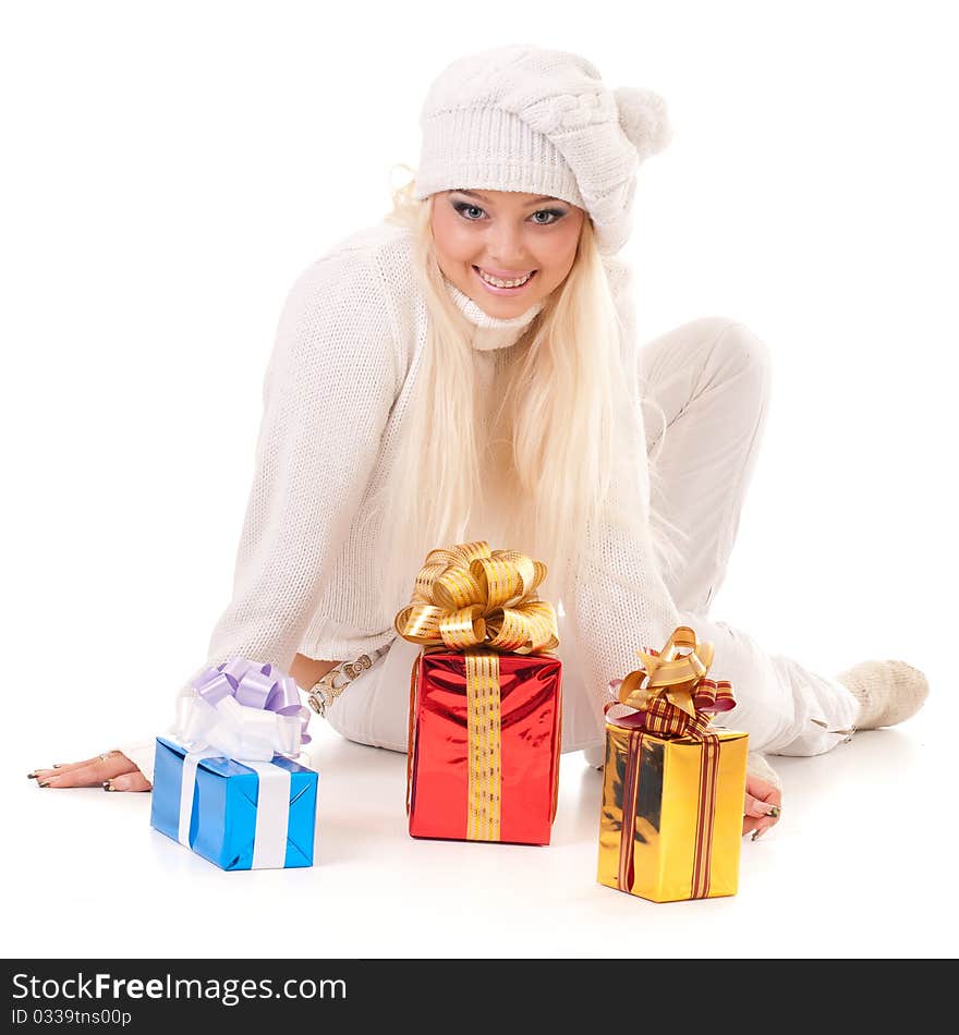 Girl holding a presents on white background