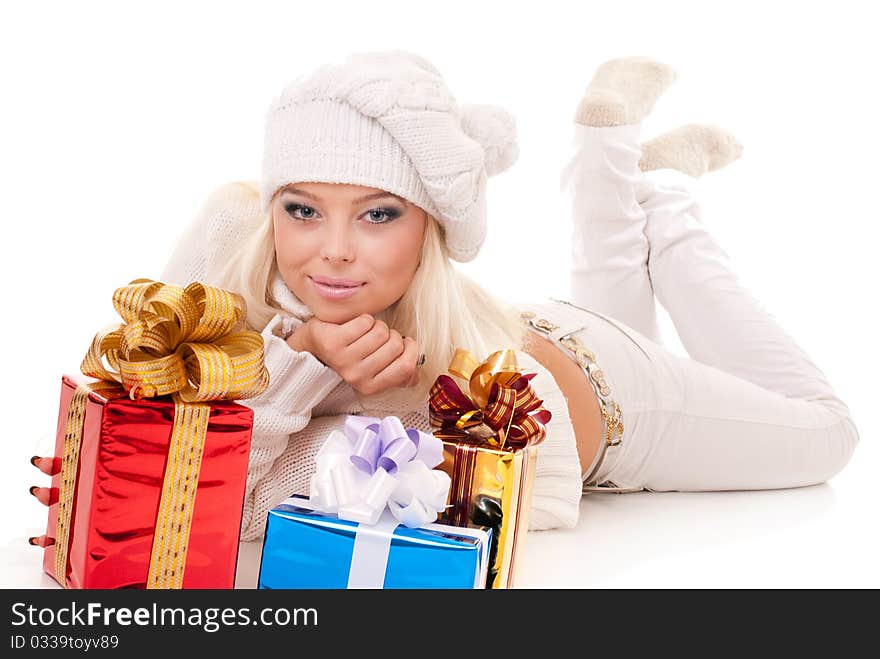 Girl holding a presents on white background. Girl holding a presents on white background