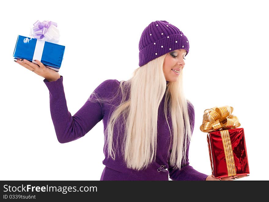 Girl holding a presents on white background