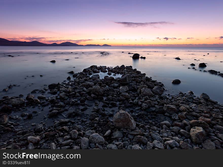 Colorful sunrise on the rocky coast, Florida, USA