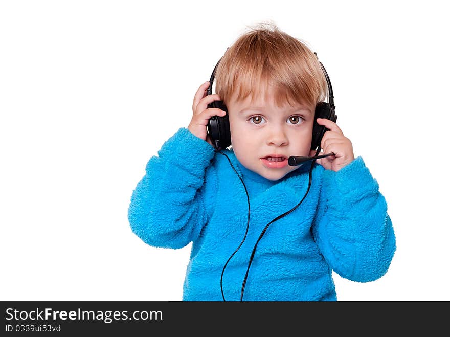 Baby with headphones, isolated on a white background. Baby with headphones, isolated on a white background.