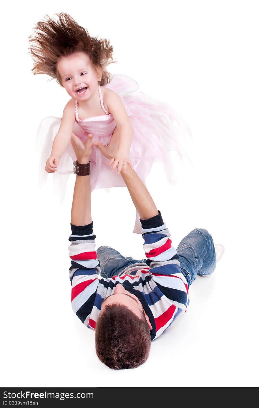 Father and daughter piggyback on white