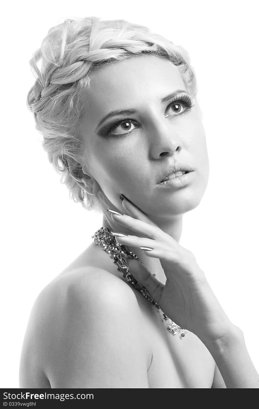 Black and white photo of a blond lady with a beautiful hair isolated on white