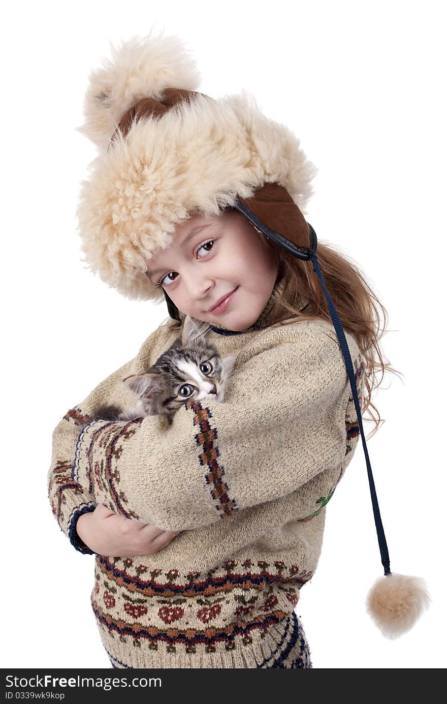 Little girl with a kitten in the hands isolated on white background