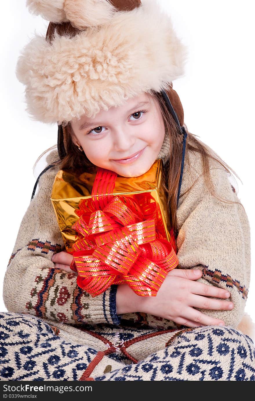 Sweet smiling girl with gift, isolated on white. Sweet smiling girl with gift, isolated on white