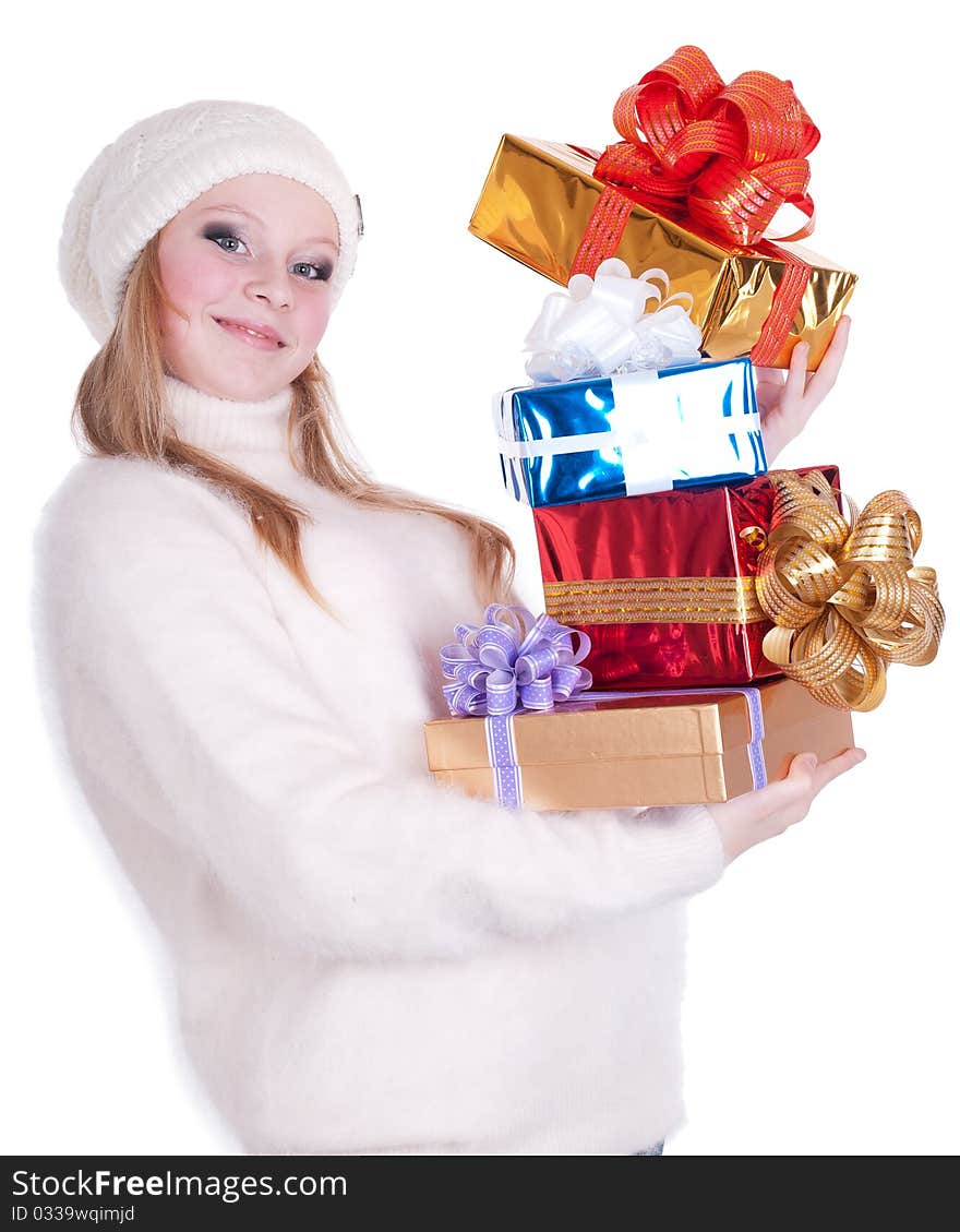 Beautiful girl with stack gift box. Isolated.