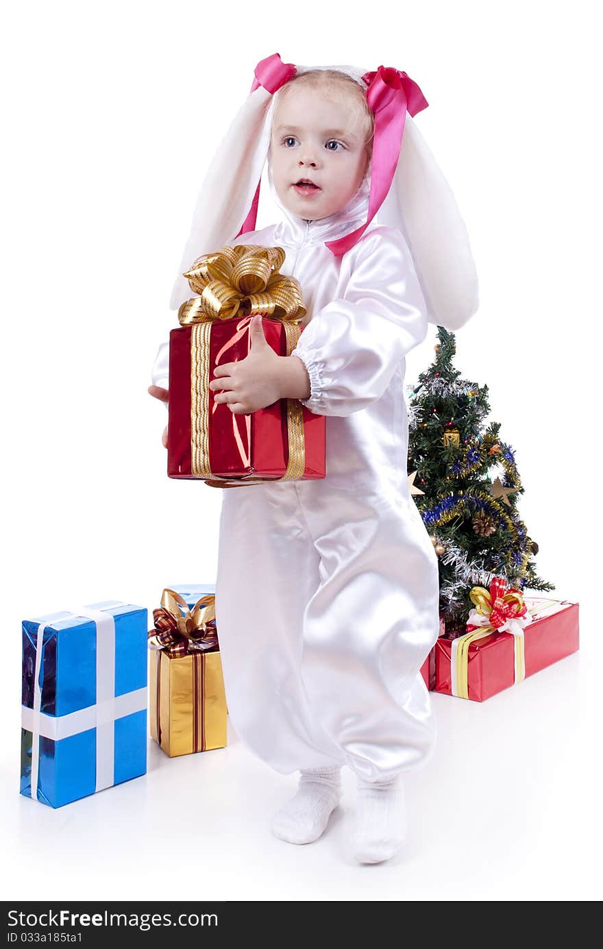 Child in a white downy bunny costume.