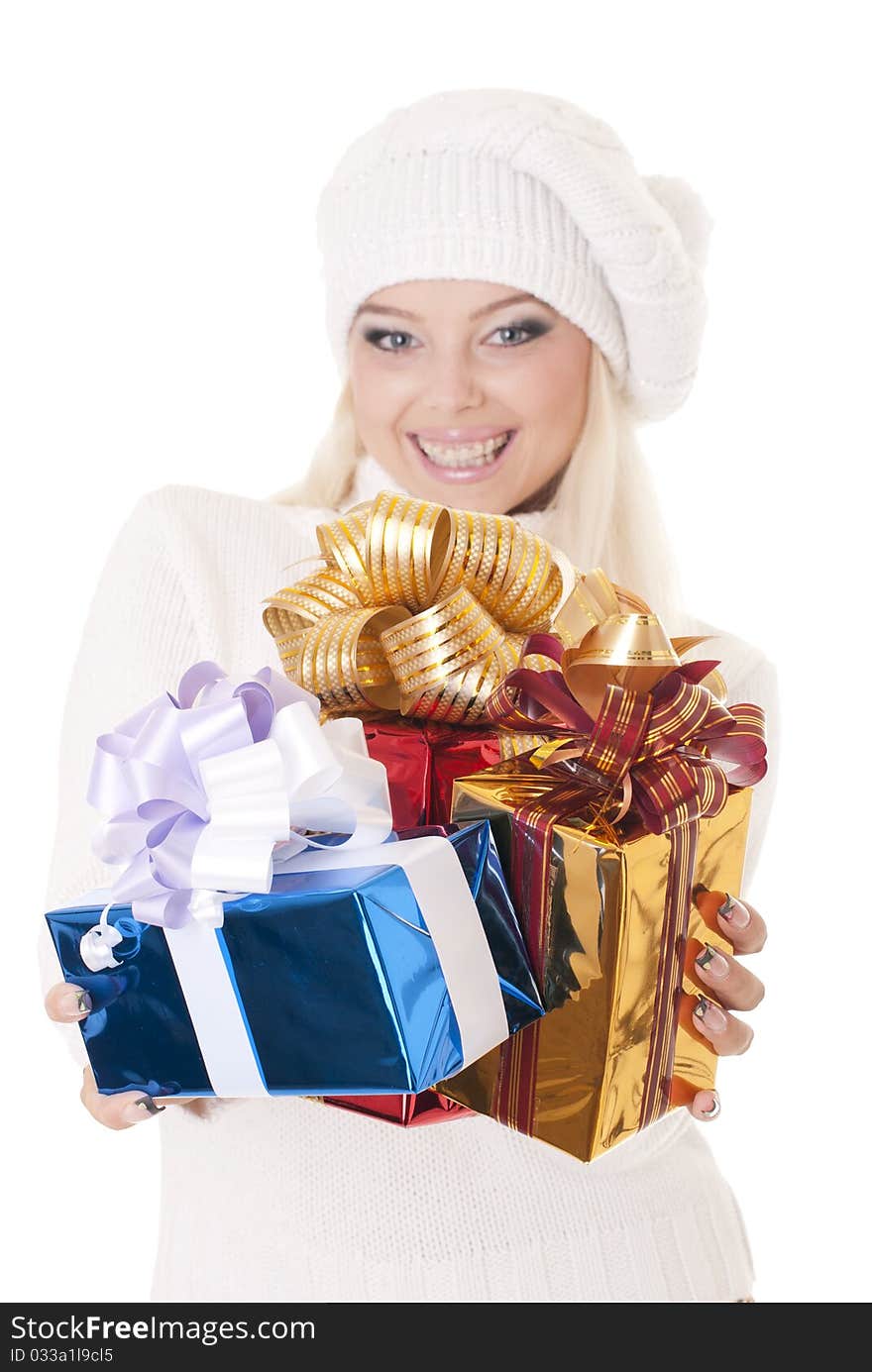 Girl holding a presents on white background